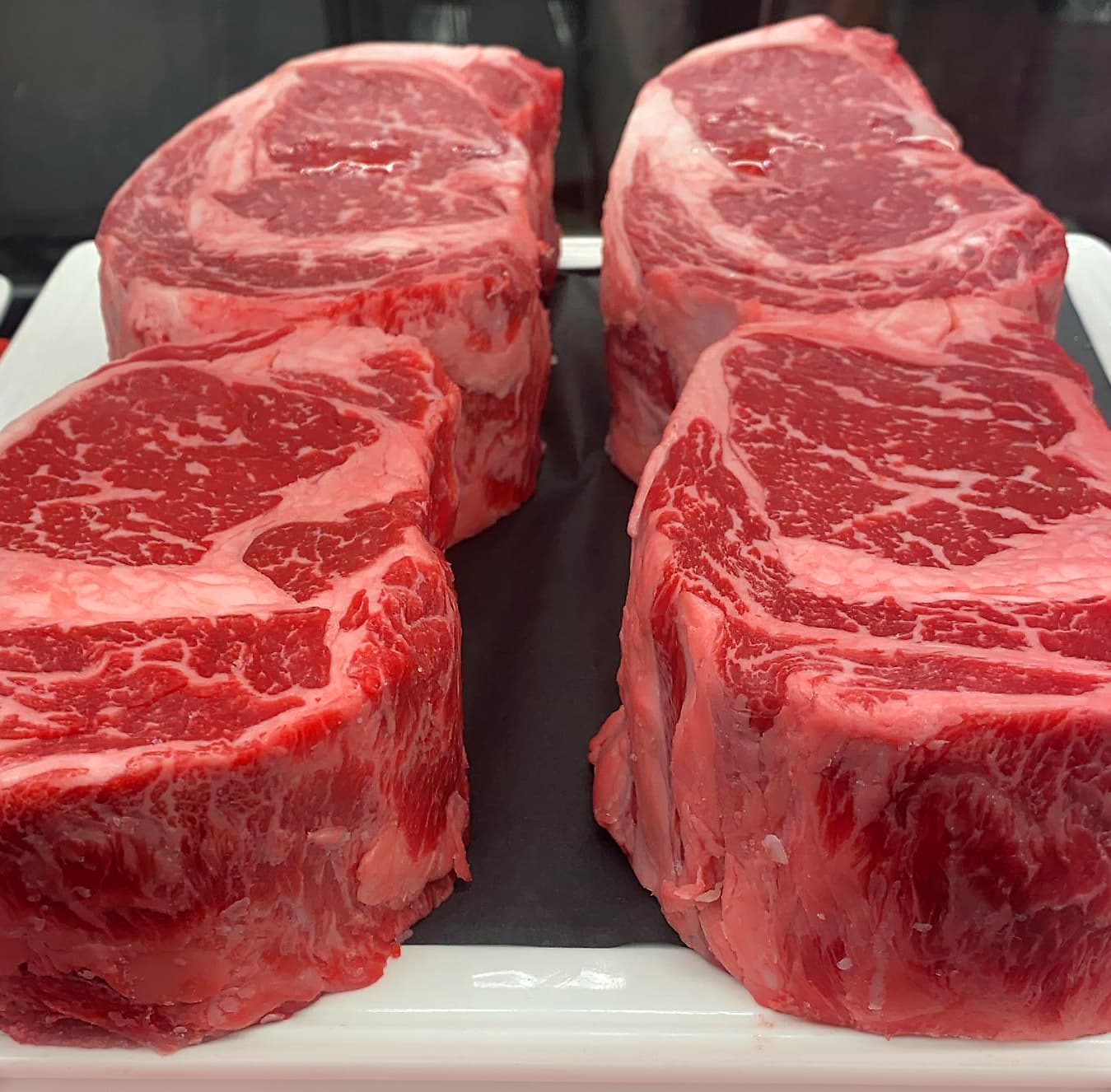 Two whole dry-aged prime cuts in Alpine's butcher case